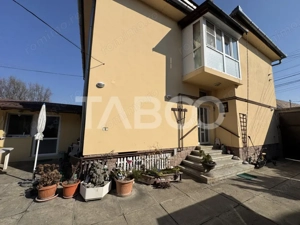 Casa individuala + apartament 2 fronturi teren 584 mp Turnisor Sibiu