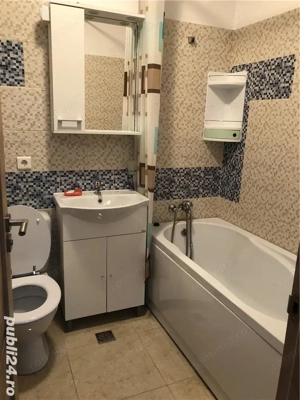 Se ofera spre inchiriere apartament cu 2 camere, decomandat, situat in zona Olimpia - imagine 4