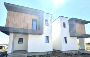 Casă individuală cu design modern și curte proprie – confort și eleganță 