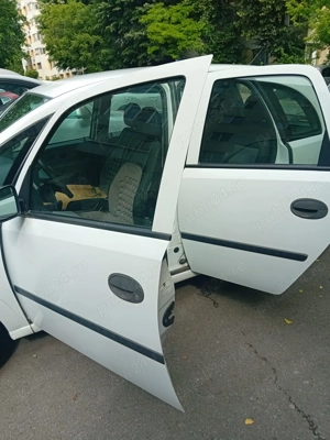 Opel Meriva 2004, motorina, 1,7 CDTi, cutie manuala, 91.000 km - imagine 4 Opel Meriva 2004, motorina, 1,7 CDTi, cutie manuala, 91.000 km - imagine 4