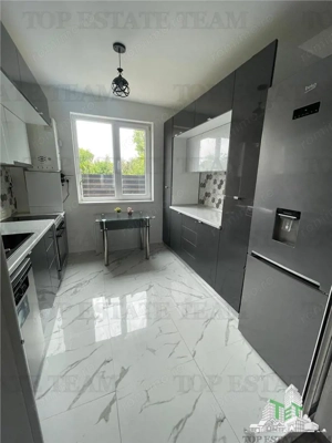 Casa cocheta, gata de locuit, intr-o zona linistita din comuna Berceni, 4 dormitoare, curte amenajat - imagine 4