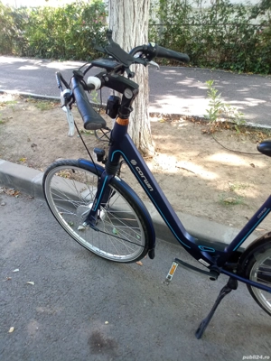 Bicicleta electrică stare  ca nouă dețin factură de proveniență și manual cu instrucțiunile necesare - imagine 4