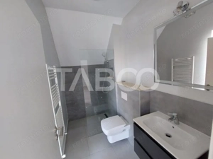 Casa de vanzare 4 camere 3 bai 119 mp cu teren 470 metri in Talmaciu - imagine 13