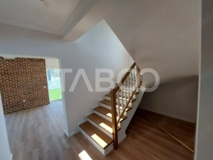 Casa de vanzare 4 camere 3 bai 119 mp cu teren 470 metri in Talmaciu - imagine 5