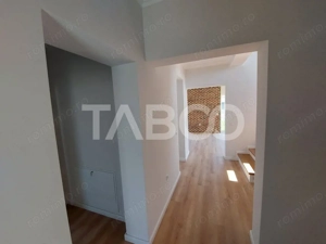 Casa de vanzare 4 camere 3 bai 119 mp cu teren 470 metri in Talmaciu - imagine 4