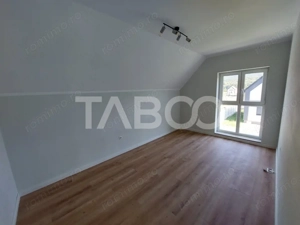 Casa de vanzare 4 camere 3 bai 119 mp cu teren 470 metri in Talmaciu - imagine 15