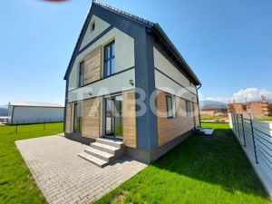 Casa de vanzare 4 camere 3 bai 119 mp cu teren 470 metri in Talmaciu - imagine 2