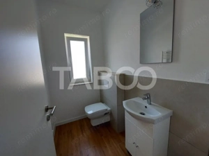 Casa de vanzare 4 camere 3 bai 119 mp cu teren 470 metri in Talmaciu - imagine 6