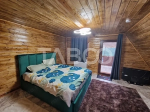 Casa tip A cu 125 mp utili si terasa 30 mp si teren 586 mp Daia Noua - imagine 2