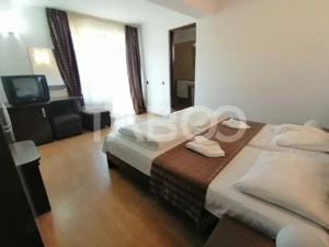 Pensiune 13 camere 16 bai sauna piscina si teren 1565 mp Cisnadioara - imagine 12