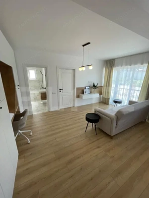 Apartament mobilat si utilat, incalzire in pardoseala, garaj, zona Terra - imagine 2
