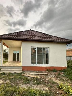 Casa noua, intabulata, in Harman.