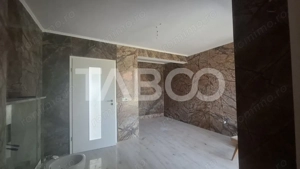 Casa de vanzare 405 mp utili 2 garaje 250 mp terase Slimnic Sibiu - imagine 4