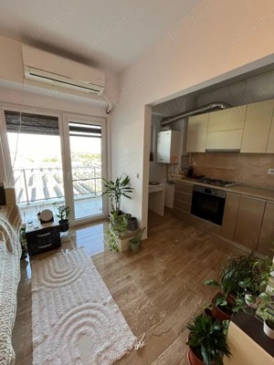 Închiriez studio cu centrală propie  - imagine 4