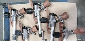 Lot aspersoare pe un tol jumate