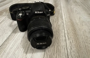 NIKON D3100 kit with Nikkor AF-S 18-55mm lens, original charger+bag