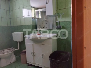 Casa 214 mp utili singur in curte 800 mp teren zona centrala Cisnadie - imagine 10