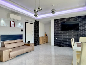 Un apartament luminos, mobilat si utilat. Calitate !