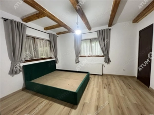 Cabana cu 7 camere 7 bai si teren 1000 mp in Avrig zona Mlaci - imagine 15