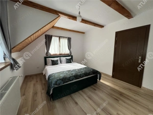 Cabana cu 7 camere 7 bai si teren 1000 mp in Avrig zona Mlaci - imagine 20