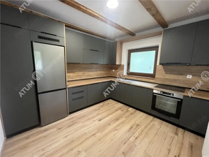 Cabana cu 7 camere 7 bai si teren 1000 mp in Avrig zona Mlaci - imagine 14