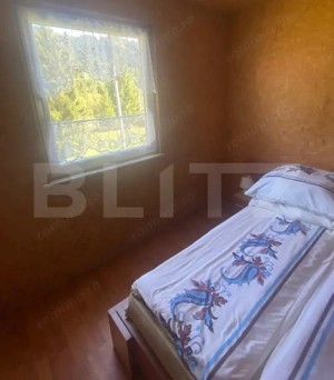 Casă de vânzare cu teren, în Pojorâta, la șosea asfaltată - imagine 10