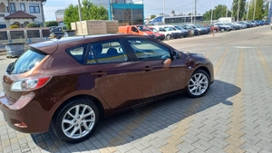 Mazda 3 ,1.6 benzina 105 cai euro 5 kenko ,160.000 km ,clima,pilot,incalzire scaune Import Germania  - imagine 2 Mazda 3 ,1.6 benzina 105 cai euro 5 kenko ,160.000 km ,clima,pilot,incalzire scaune Import Germania  - imagine 2