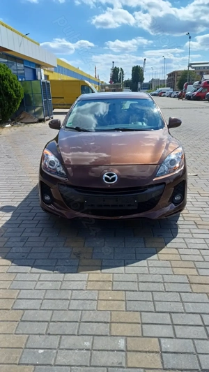 Mazda 3 ,1.6 benzina 105 cai euro 5 kenko ,160.000 km ,clima,pilot,incalzire scaune Import Germania  - imagine 8 Mazda 3 ,1.6 benzina 105 cai euro 5 kenko ,160.000 km ,clima,pilot,incalzire scaune Import Germania  - imagine 8