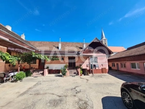 Casa cu spatiu comercial de vanzare in Sebes zona centrala - imagine 3