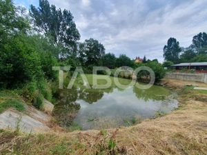 Teren intravilan 1500 mp - parcelabil - utilitati - Front 30 m - imagine 7