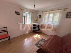 Casa de vanzare 4 camere 2 bai 1162 mp de curte si gradina in Toderita - imagine 3