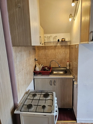 Vand garsiniera in sinmartin in centru etaju 3 cu nr de apartament cimplect mobilata