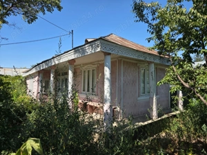 Teren intravilan și casa batraneasca