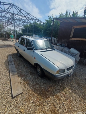 vînd Dacia 1410 an 2003