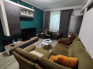 Apartament 3 camere (2 dormitoare, sufragerie, baie si bucatarie)