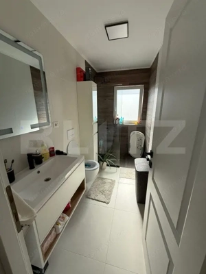 Apartament cu 3 camere, 65 mp si un foișor cu gradina de 191 mp - imagine 9