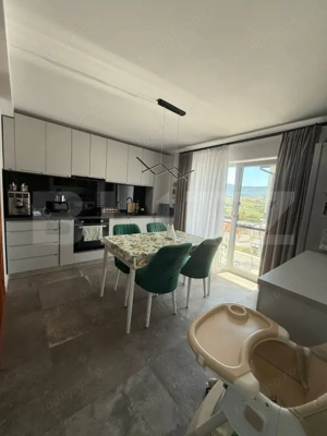 Apartament cu 3 camere, 65 mp si un foișor cu gradina de 191 mp - imagine 2