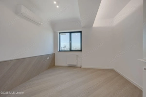 Apusul de la ultimul etaj din Cortina North | 3 camere | 76.7 mp - imagine 9