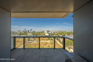 Apusul de la ultimul etaj din Cortina North | 3 camere | 76.7 mp - imagine 4