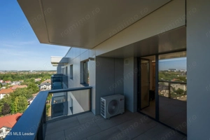 Apusul de la ultimul etaj din Cortina North | 3 camere | 76.7 mp - imagine 17