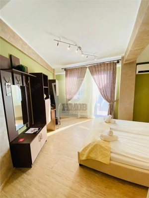 Studio de lux 40 mp cu balcon in zona Centrala - imagine 2