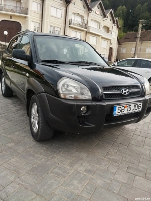 Hyundai  TUCSON 4x4 la buton vand sau schimb - imagine 2 Hyundai  TUCSON 4x4 la buton vand sau schimb - imagine 2