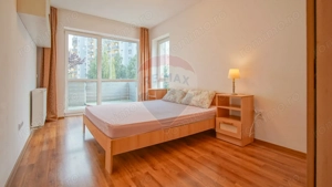 Apartament spațios cu grădină, vedere la munte și potențial comercial