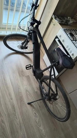 Vând bicicleta electrica CUBE