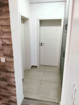 Nou. Laga Eso. Spatios - 90 mp utili + terasa. Complet mobilat si utilat - imagine 18