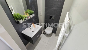 Apartament  renovat 4 camere Centrul Civic - imagine 11
