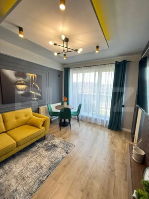 Apartament mobilat si utilat, terasa de 14 mp, parcare subterana, zona Terra