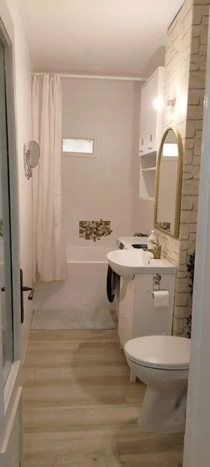 Inchiriez apartament zona centrala cu loc de parcare