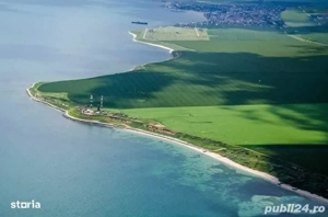 Proprietari vindem  21 ha la mare aproape de statiunea NIBIRU pe  faleza  farului TUZLA15$mp