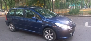 De vânzare un Peugeot brek 307 motor 1.6 benzina foarte economic  - imagine 4 De vânzare un Peugeot brek 307 motor 1.6 benzina foarte economic  - imagine 4